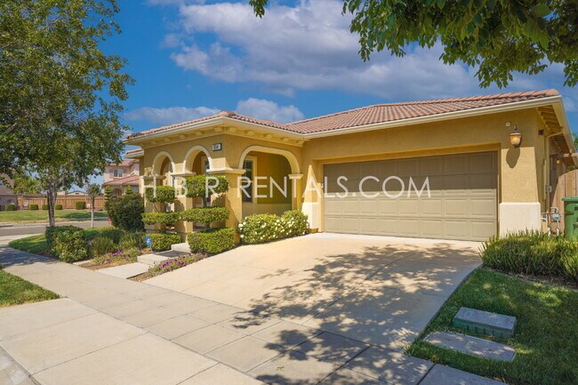 Building Photo - Questa Village - Single Story Charming 3-B...