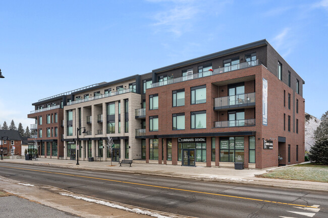 Building Photo - Switzer on Main – Modern Living in the Heart of Stittsville