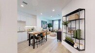 Located at 6535 Alvarado Road in San Diego, CA, this thoughtfully designed one-bedroom, one-bathroom residence offers a smart, efficient layout across a single floor. Light wood flooring flows throughout the space, complementing a clean, modern aesthetic defined by white walls and recessed lighting.

The open-concept kitchen is outfitted with sleek white flat-front cabinetry, stainless steel appliances including a gas range and French door refrigerator, a tile backsplash, and under-cabinet lighting. A butcher block island with bar seating connects the kitchen seamlessly to the dining and living areas, making it ideal for both everyday living and entertaining.

The living room is bright and welcoming, with large windows dressed in floor-length curtains that invite natural light. A door provides additional access, adding to the airy feel of the space.

The generously sized primary bedroom features a ceiling fan, ample closet storage, and windows with curtains, creating a calm and comfortable retreat. The bathroom includes a full soaking tub with a marble-style tile surround and built-in shelving for storage.

Throughout the residence, thoughtful design details and a cohesive neutral palette create a contemporary and functional living environment.