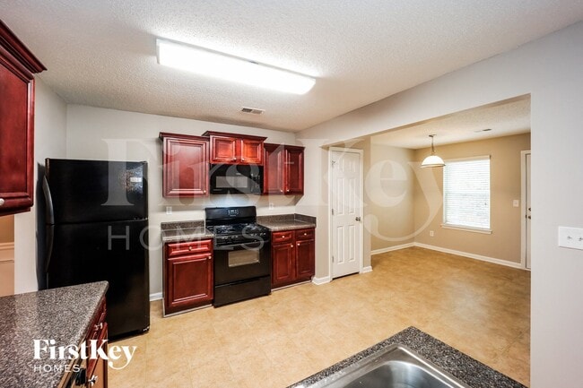 Foto del edificio - 5440 Bluegrass Dr