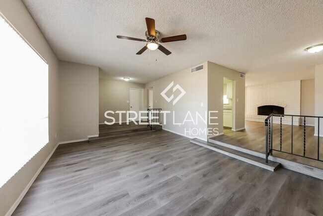 Building Photo - REDUCED! - NOW OFFERING HALF OFF THE FIRST...