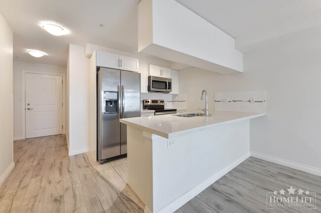 Building Photo - Modern 1-Bedroom Condo at Paddington Station – Air Conditioning, Fireplace & Prime Langley Location