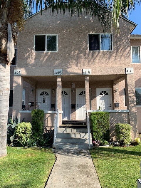 Front - 409 E 56th St