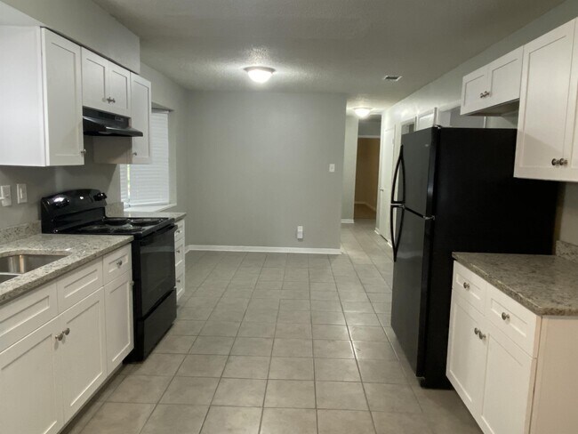 Building Photo - 6661 Apache Run
