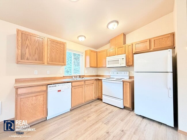 Building Photo - Spacious Graham Home with 2-Car Garage & Large Backyard