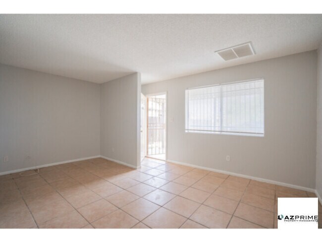 Building Photo - Welcome to this Charming and Affordable 2/...