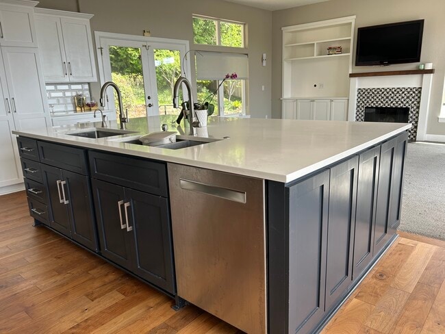 brand new kitchen with enormous island and lots of storage - 3447 SW Doschview Ct