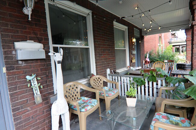 Front porch of 372 E Oakland - 372 E Oakland Ave