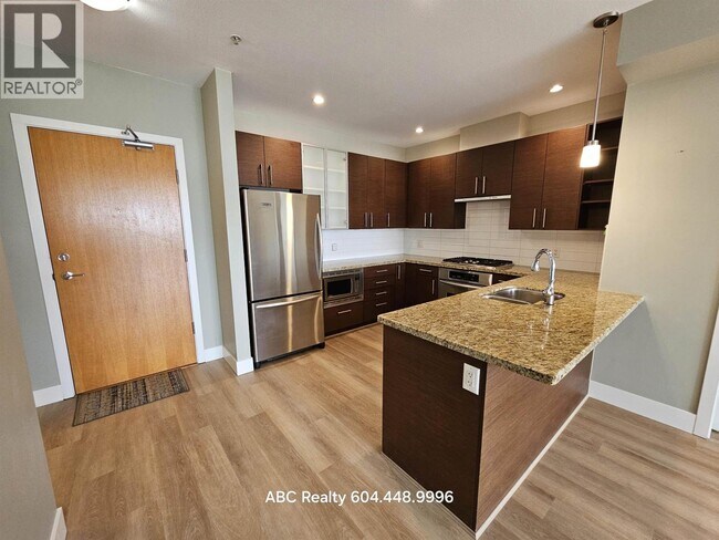 Photo du bâtiment - 14300-14300 Riverport Way