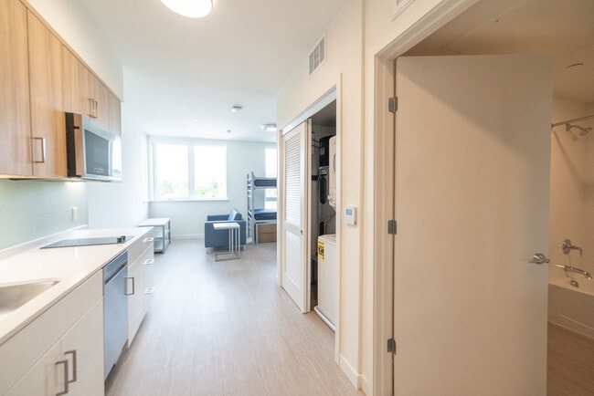 Building Photo - Secure Your Dream Home at RUMI – Fully Furnished Units with Stunning Views!