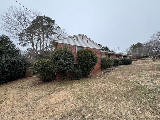 Building Photo - Brick 3/1.5 bath house with bonus in North...