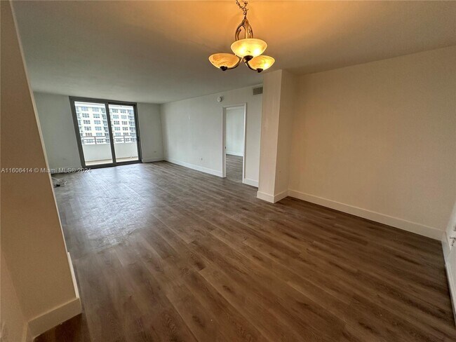 Building Photo - 5555 Collins Ave