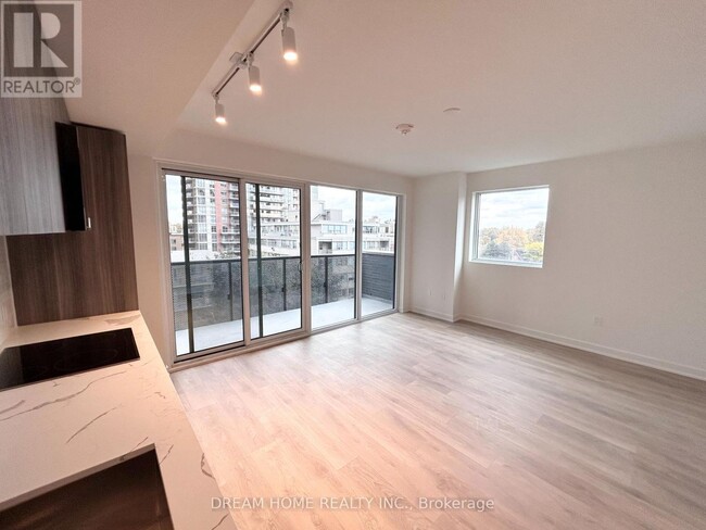 Photo du bâtiment - 117-117 Broadway Ave