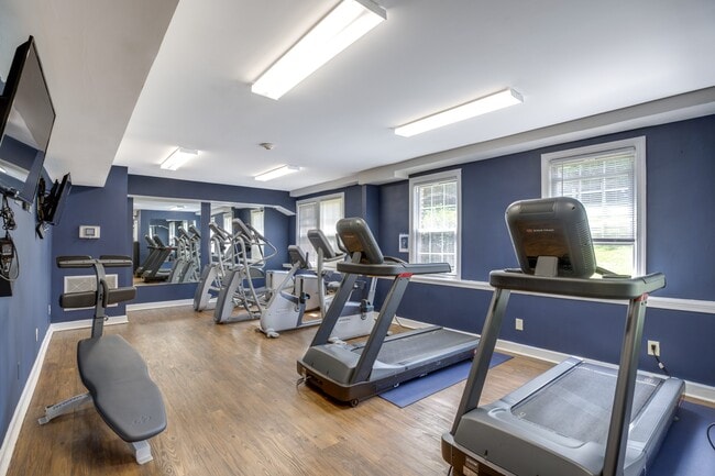 a fitness center with treadmills at Park Crest Apartments, District of Columbia 20007 - Park Crest Apartments