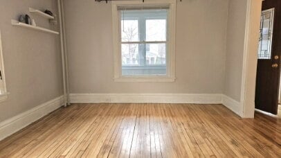 Building Photo - "3-Bed Oasis with Gleaming Hardwood Floors & 2 Full Baths in Prime Minneapolis Location!"