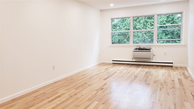 Building Photo - 209-28 23rd Ave