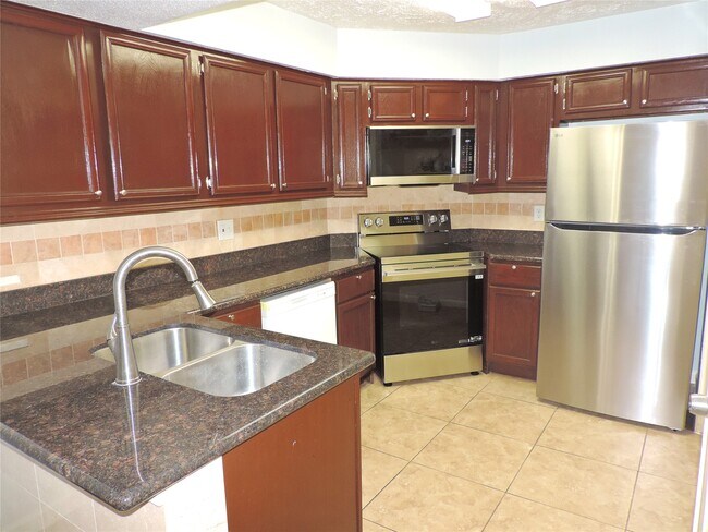 Foto del edificio - 10555 Turtlewood Ct