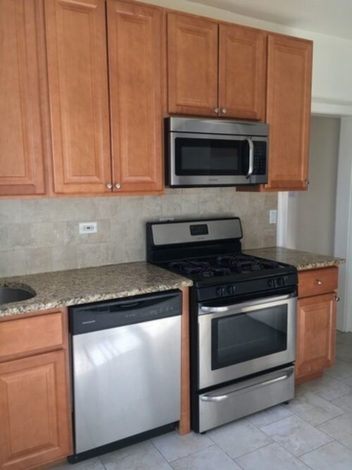 Foto del edificio - 6308 N Oakley Ave
