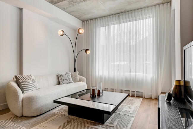 Photo du bâtiment - SUMA – condos locatifs