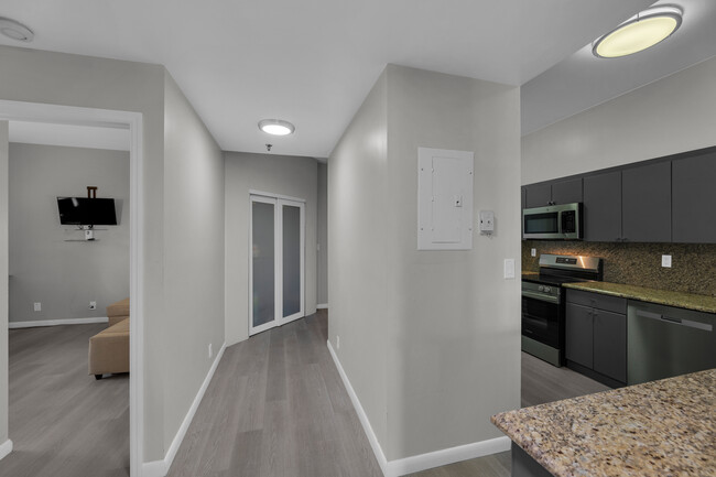 Hallway leading to kitchen and living area - 8816 Collins Ave