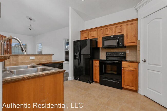 Building Photo - 4 br, 2.5 bath House - 1100 S Grayling Avenue