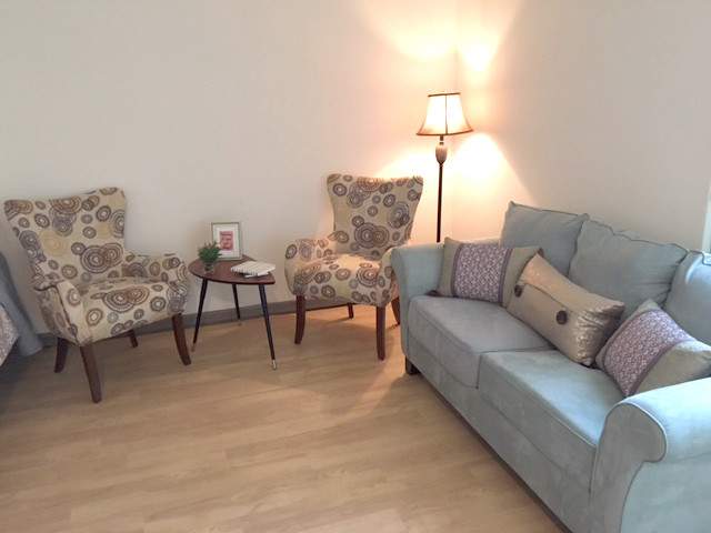 Efficiency Apartment Living Room - Tabco Towers Senior Housing