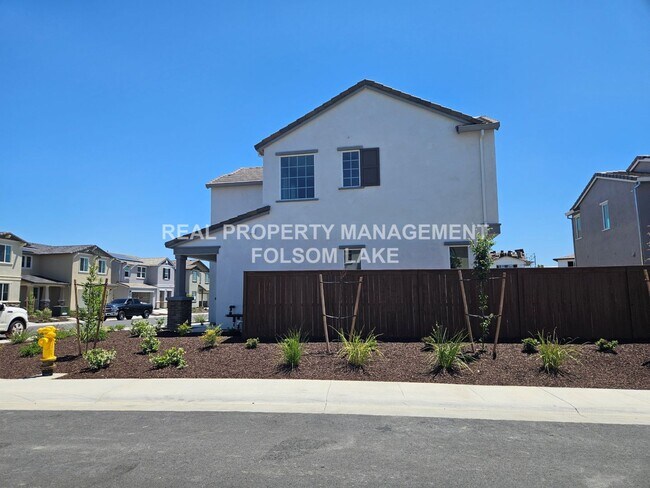 Building Photo - New 3 Bedroom 2.5 bath corner lot, split l...