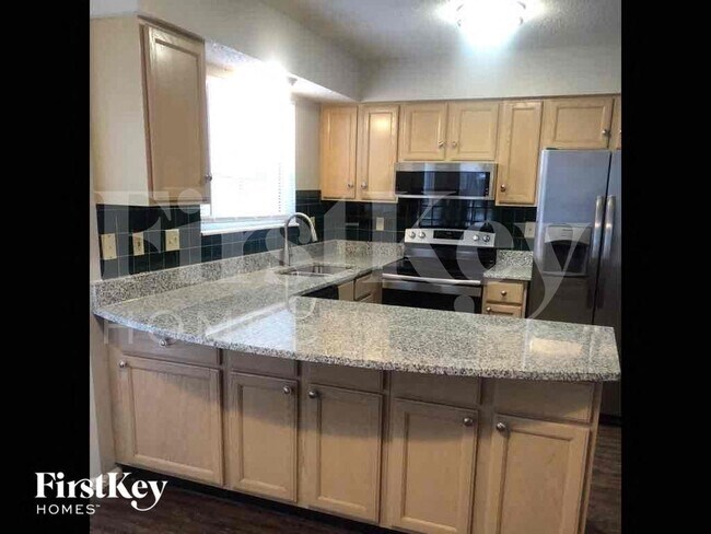 Foto del edificio - 4801 Greenburg Dr