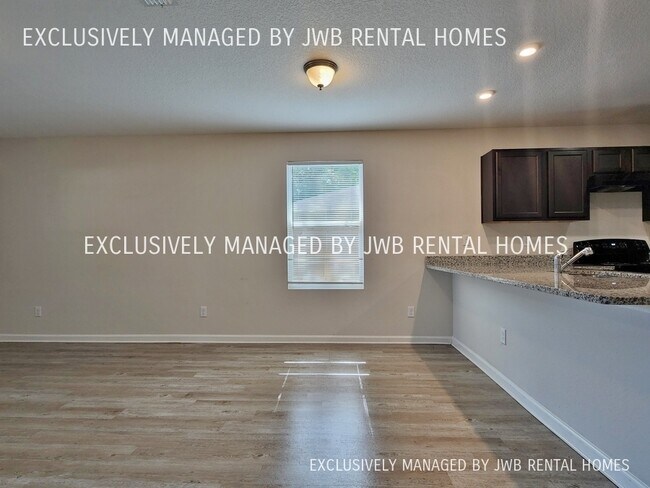 Building Photo - 9081 Eaton Ave