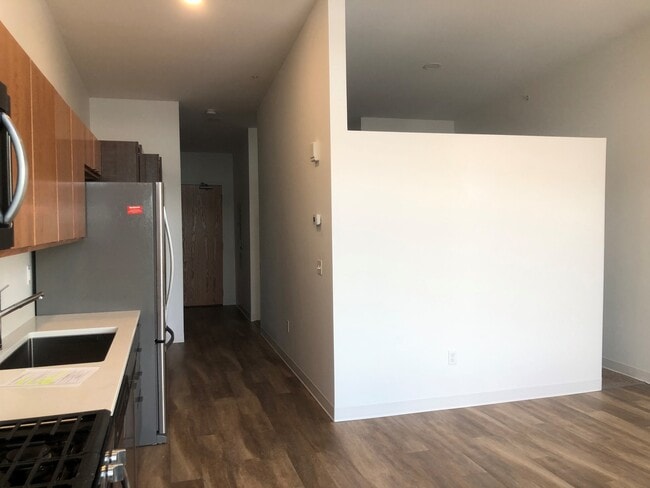 Kitchen View to Entry Door and Bedroom - ONE Lakeview