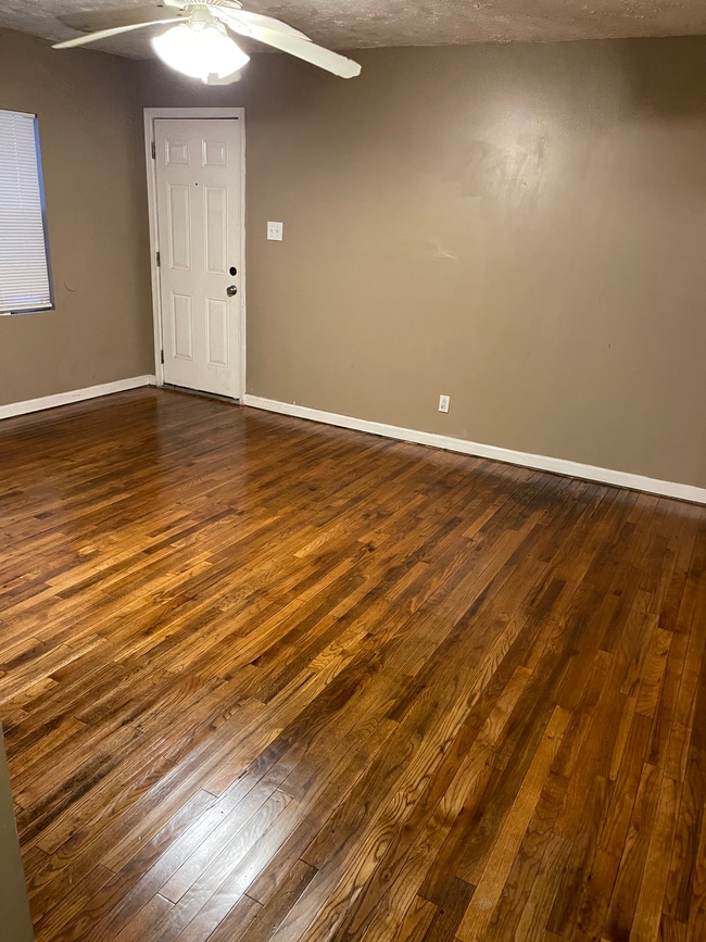 Living Room with Front Door - 2028 Levin St