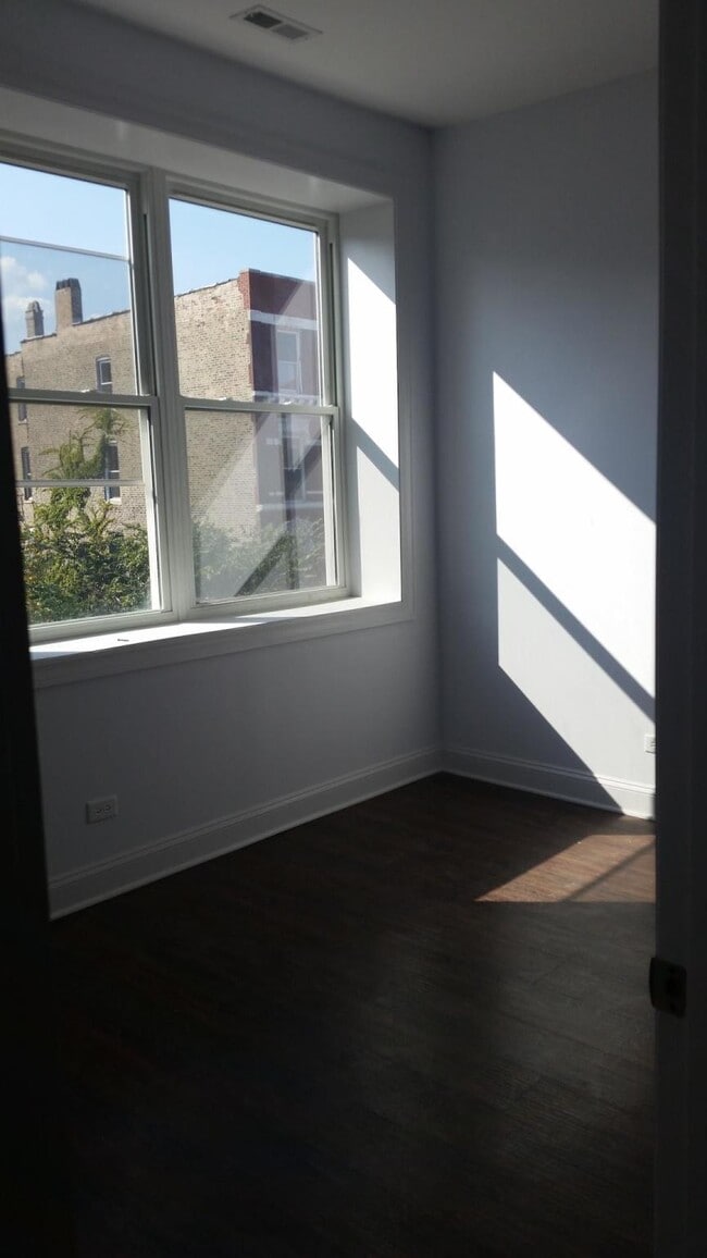 Building Photo - 1717 S Racine Ave