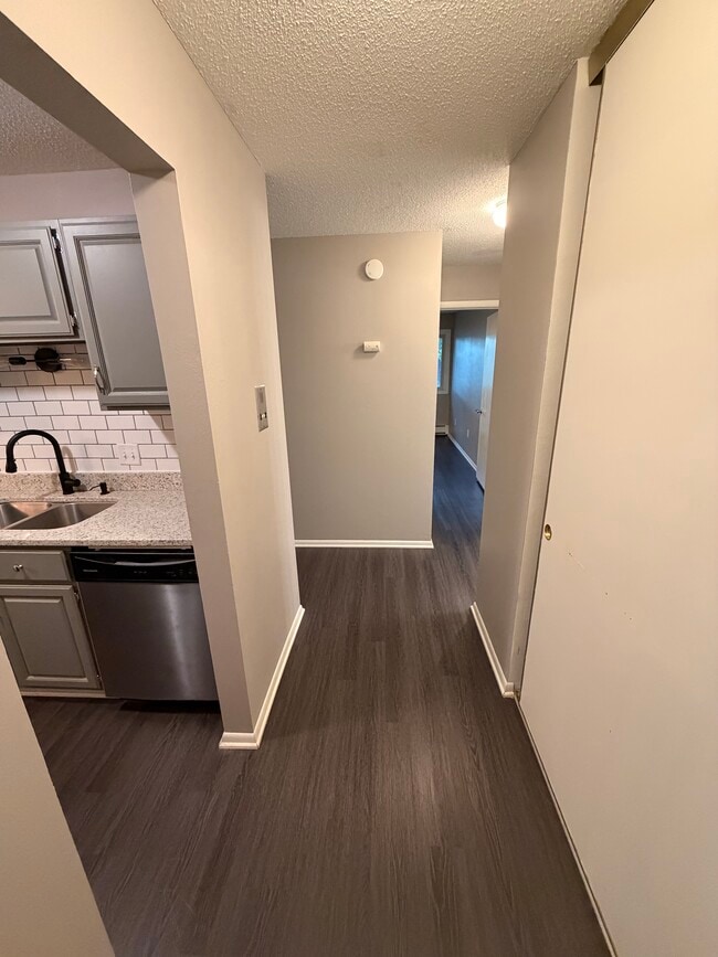 Entry view L to R. kitchen, hall to L-R, 2nd BR, around corner is M-BR, 2nd Bath and hall closet. - 8935 Old Cedar Ave S