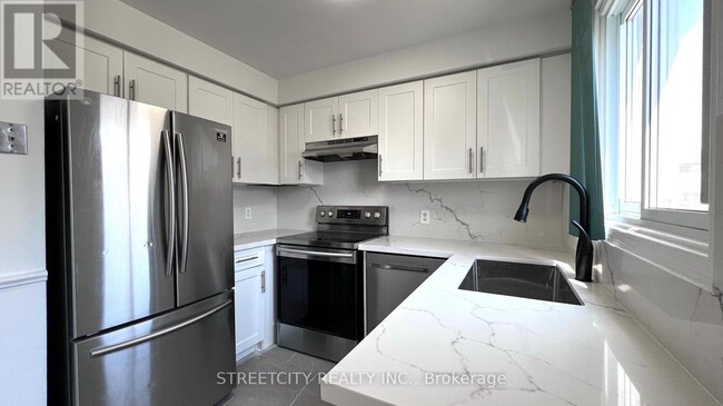 Building Photo - 1430 Jalna Blvd