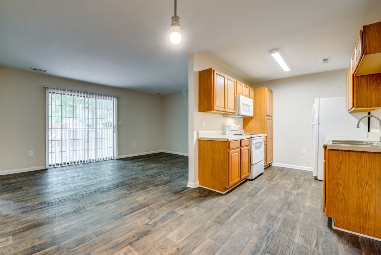 Ample light and spacious living areas - Sharon Oaks Apartments