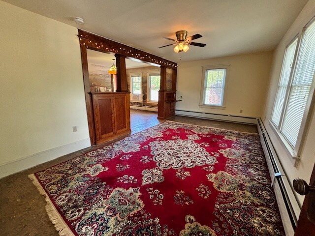 Very spacious living room with build in cabinets and secretary desk - carpet will be removed - 325 Flynn Ave