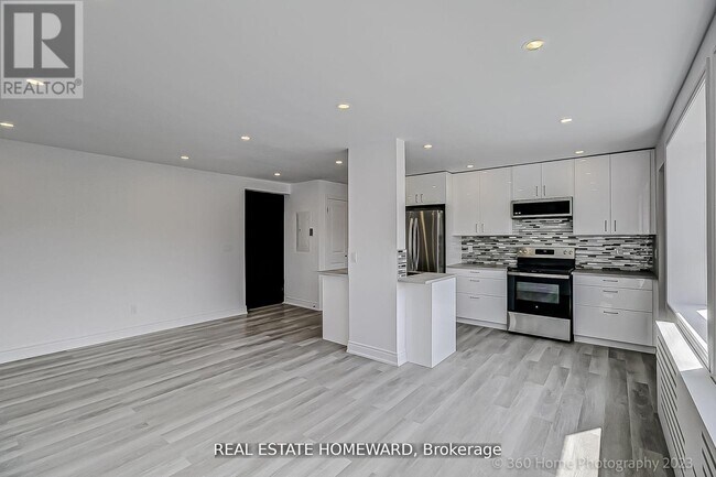 Photo du bâtiment - 419-419 Woodbine Ave