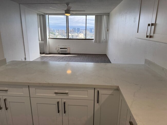 Photo - Renovated 1BR Condo in Downtown located in a secured building on the 25th floor