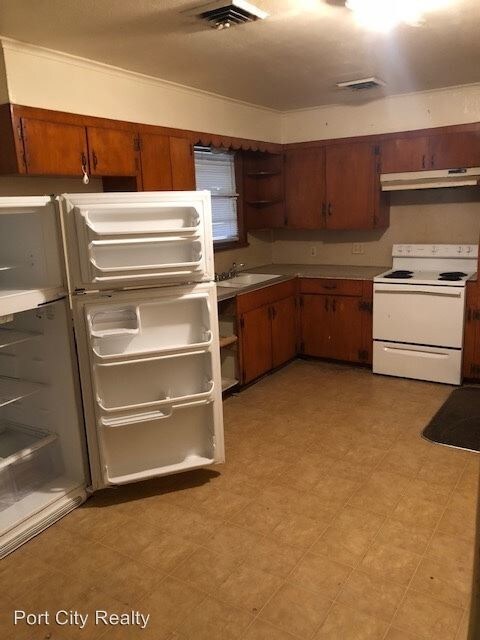Building Photo - 4 br, 2 bath House - 6808 W. Canal Blvd.