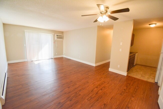 Building Photo - Main floor condo with great patio & many u...