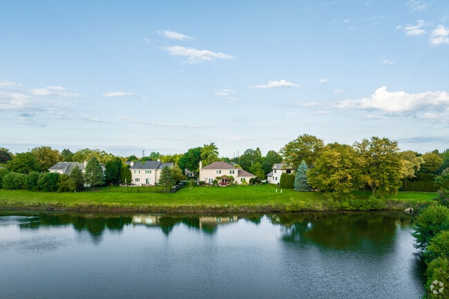 Several homes in Westchester Estates are right by the water of Hidden Lake.