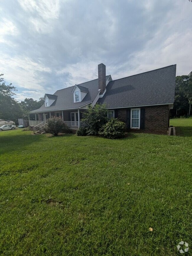 Building Photo - 5145 Riverbend Rd