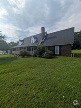 Building Photo - 5145 Riverbend Rd
