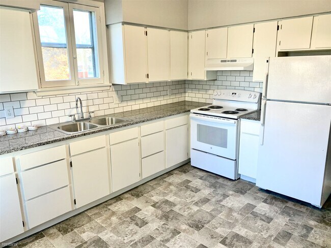 Foto del edificio - 2 br, 1 bath Duplex - 2530 West Gardner Av...