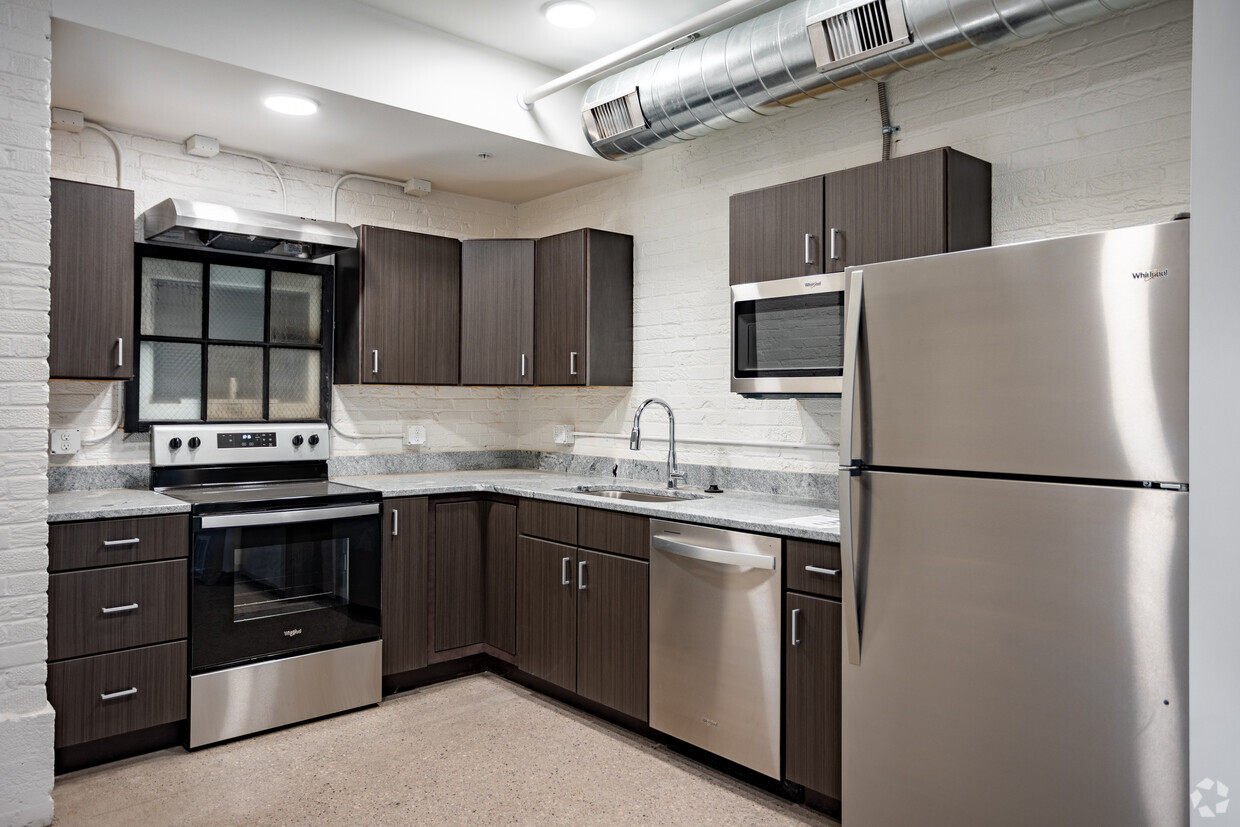 Unidad 116 - 1HAB, 1BA - 874SF - Cocina - Bowstring Lofts
