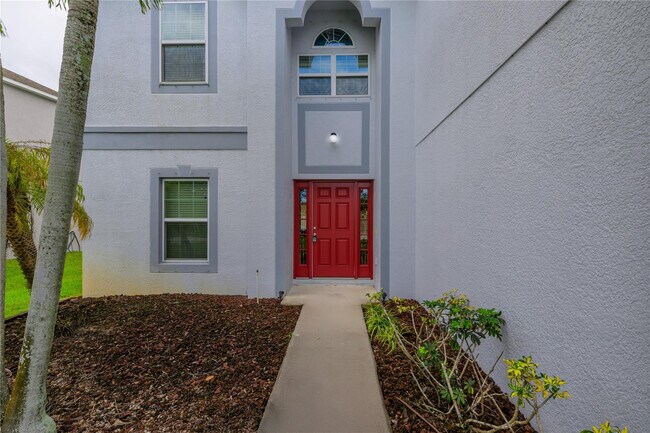 Foto del edificio - 6147 NW Butterfly Orchid Pl