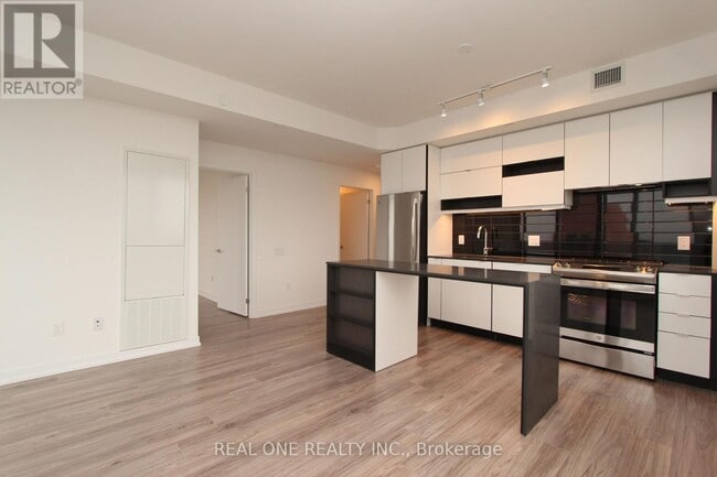 Photo du bâtiment - 4065-4065 Confederation Pkwy