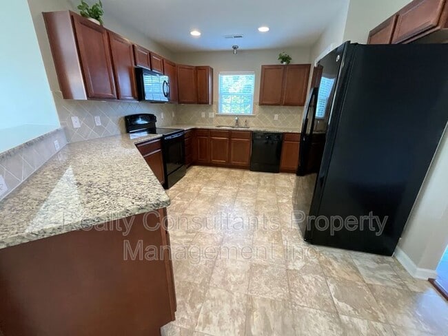 Building Photo - 6143 Trotting Pl
