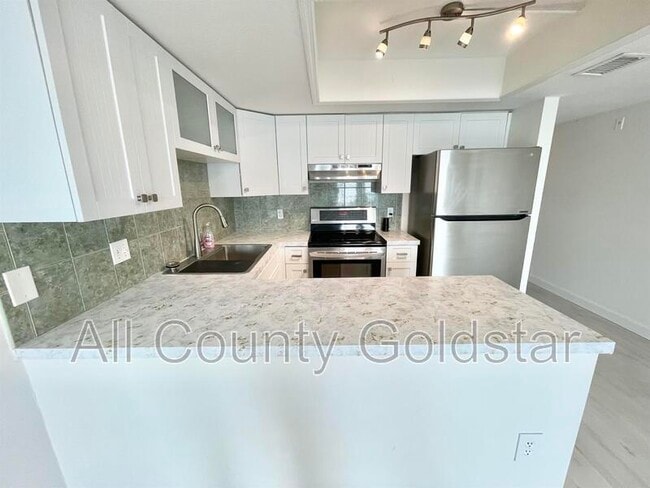 Foto del edificio - 4410 Warren Ave