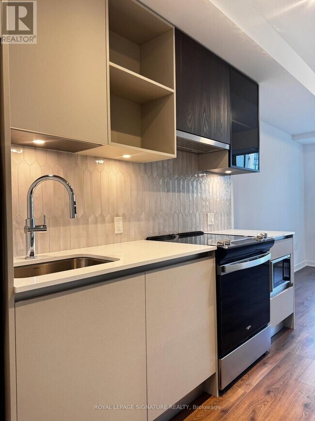 Photo du bâtiment - 395-395 Dundas St W